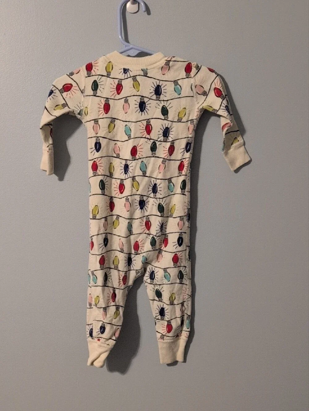 Hanna Andersson Cream Footed One-Piece with Multicolor Light Bulb Print